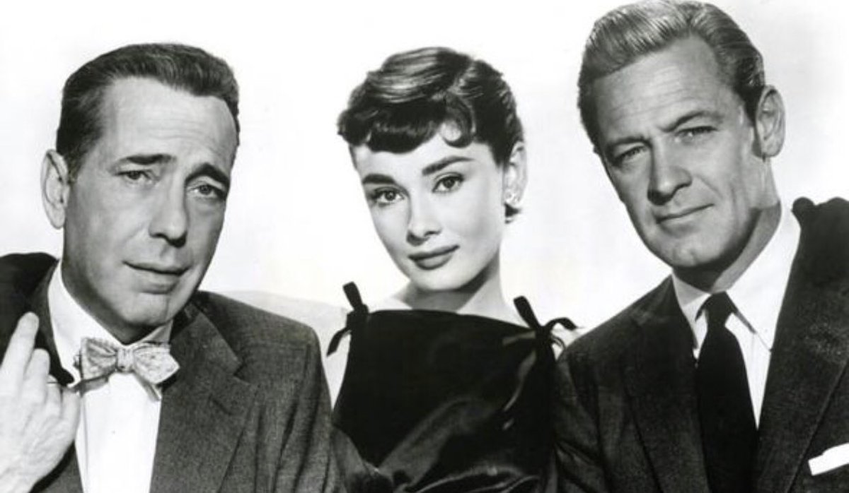 From left, Humphrey Bogart, Audrey Hepburn, and Willilam Holden, star in "Sabrina"